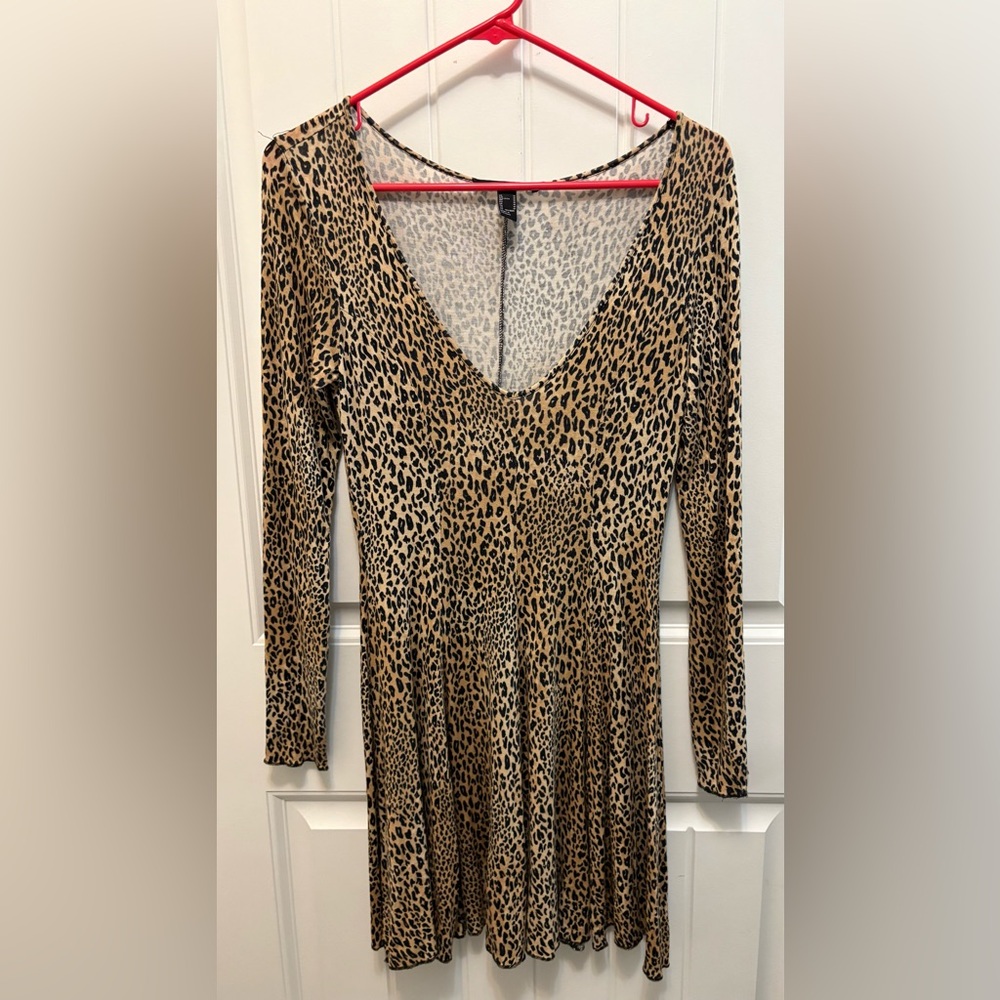 Forever 21 Animal Print Long Sleeve v-neck Dress. Woman’s size Medium.